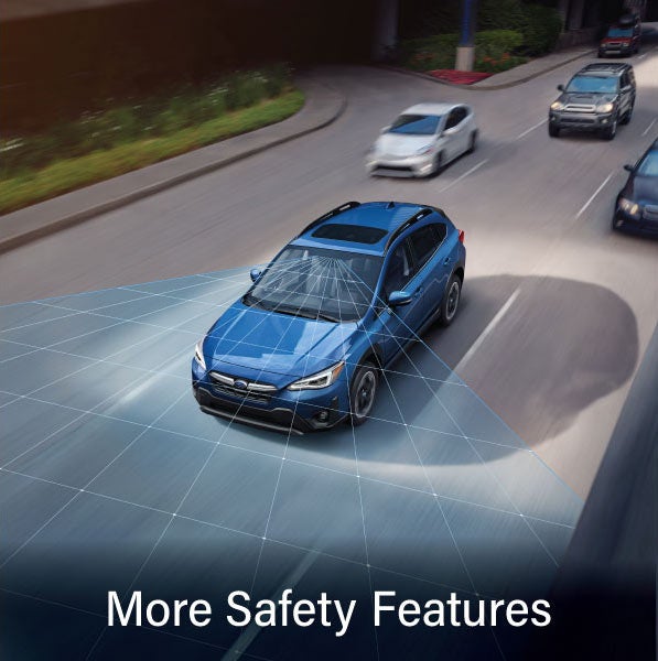 A Subaru Crosstrek in blue with the words &ldquo;More Safety Features&ldquo;. | LaFontaine Subaru in Commerce Township MI