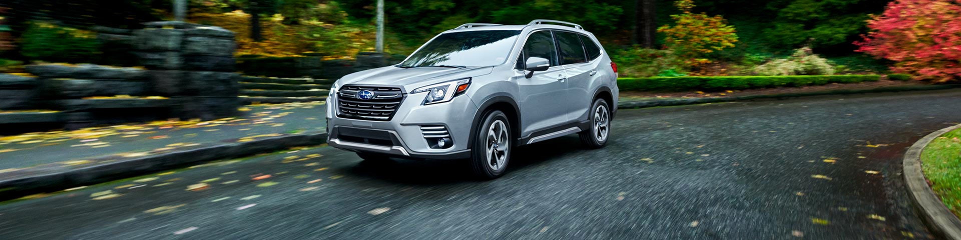 A 2022 Forester driving on a highway. | LaFontaine Subaru in Commerce Township MI