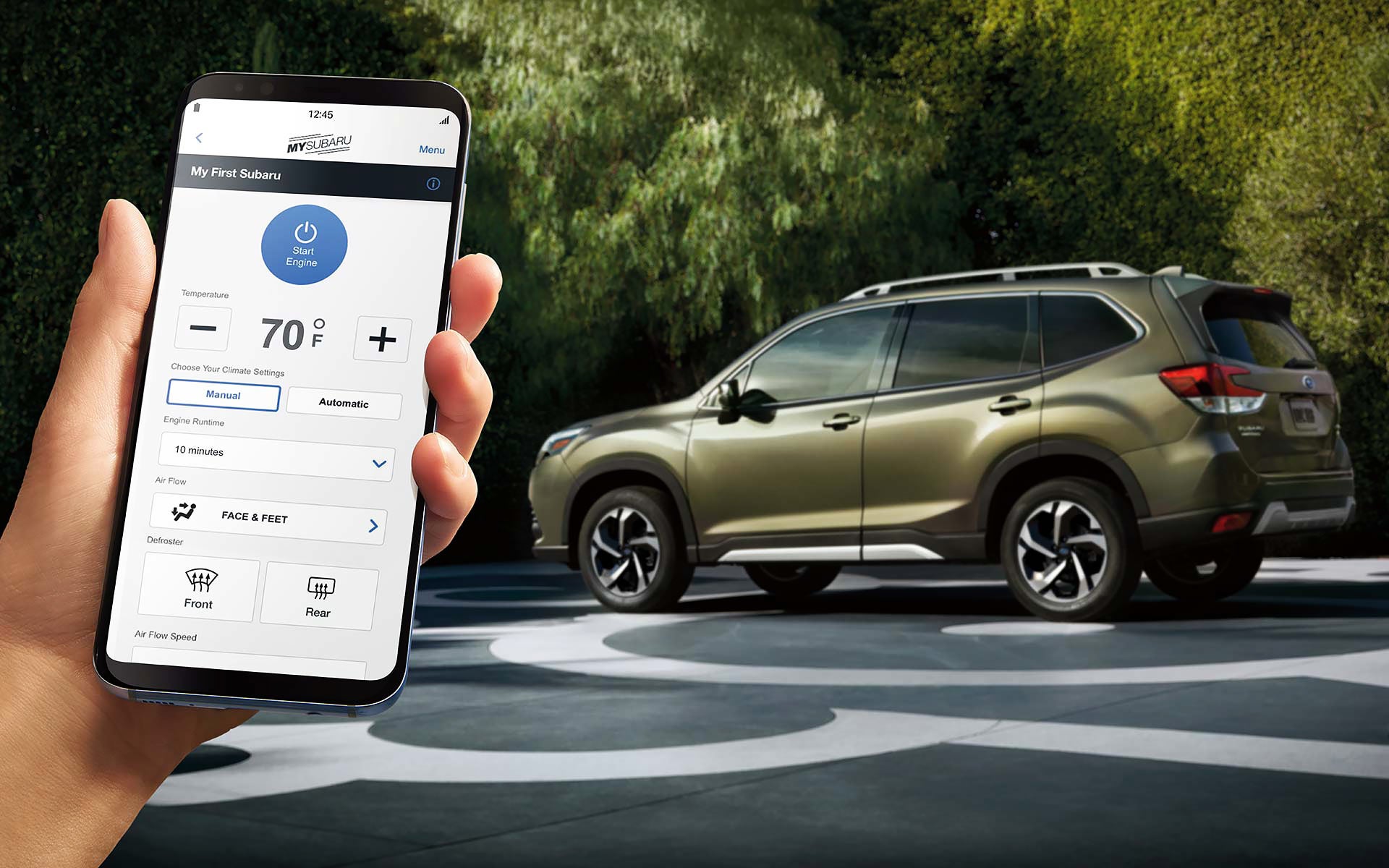 A close-up of a phone showing the Remote Engine Start with Climate Control feature of SUBARU STARLINK® Safety and Security available on the 2022 Forester. | LaFontaine Subaru in Commerce Township MI