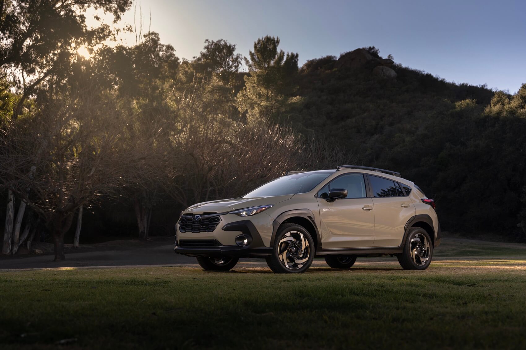 Subaru Crosstrek Hybrid in front of trees
